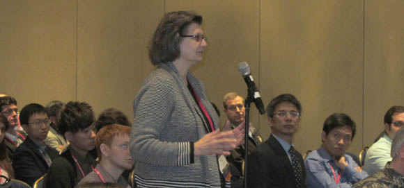 Maryellen Giger asks a question from the audience during presentations by LUNGx Challenge participants during the 2015 conference