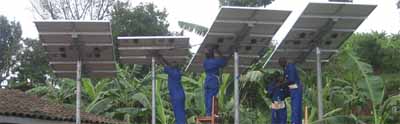 SELF participants install solar panels, Africa