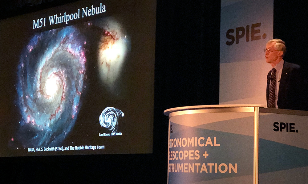 Plenary speaker John Mather delivering a talk at SPIE Astronomical Telescopes + Instrumentation event