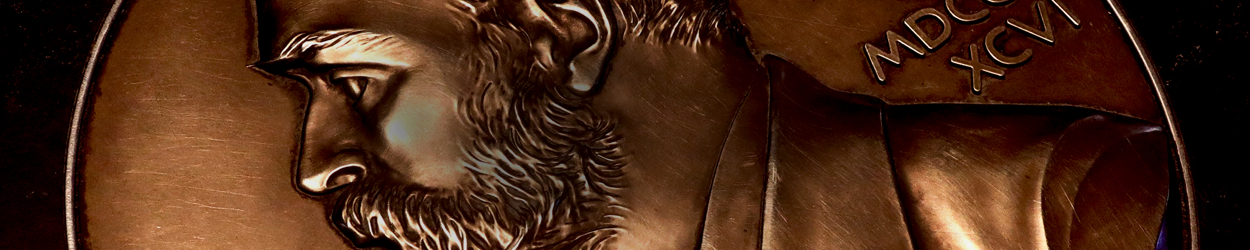 Close up of the Nobel coin