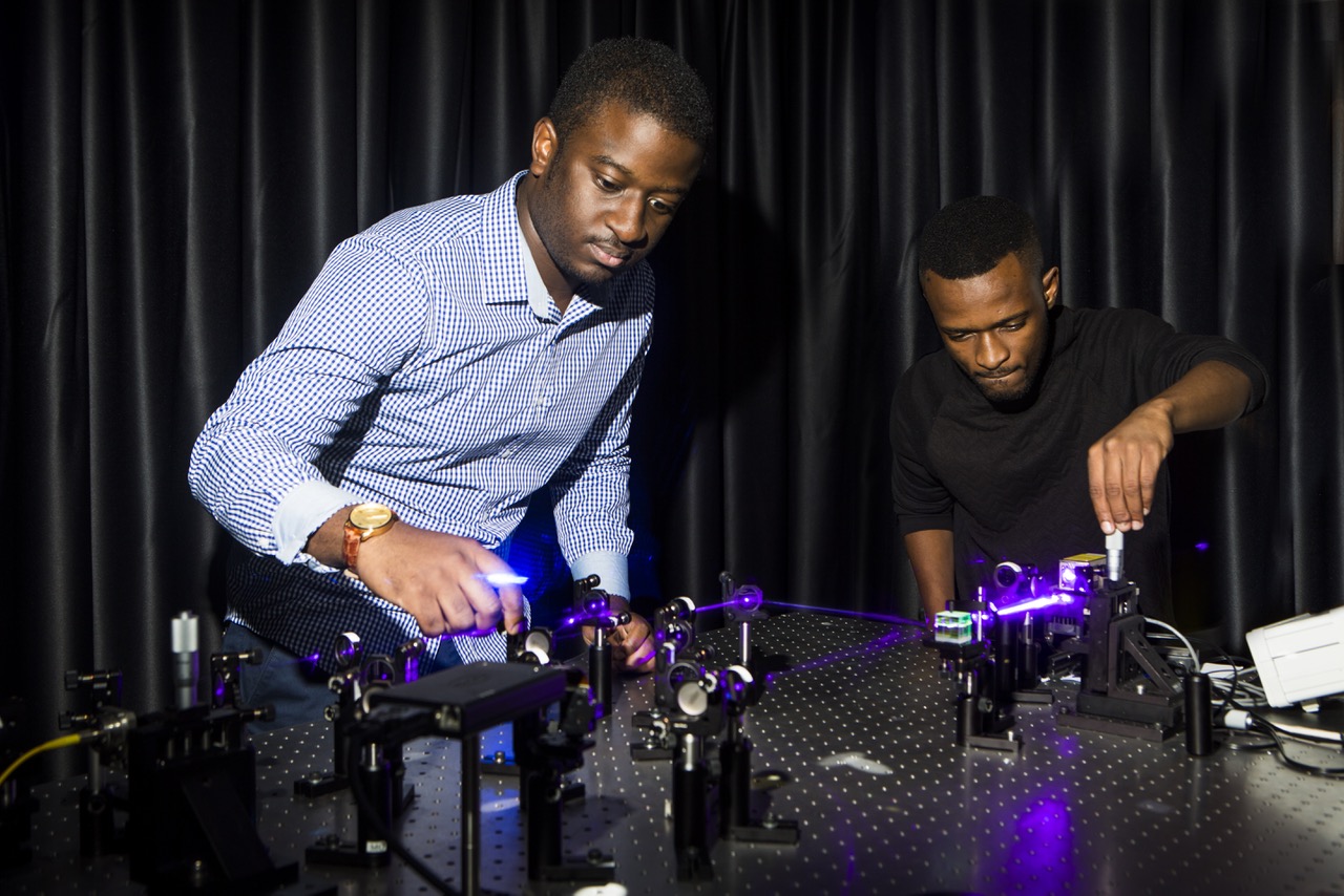 PhD students Bienvenu Ndagano and Isaac Nape in the Structured Light Lab.