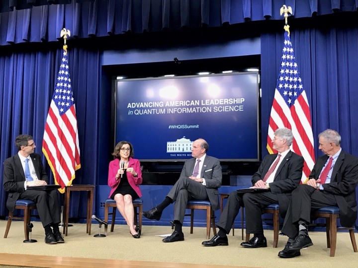 Jake Taylor moderating a discussion at the White House Summit on Advancing American Leadership in QIS 